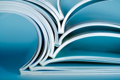 Stack of opened magazines